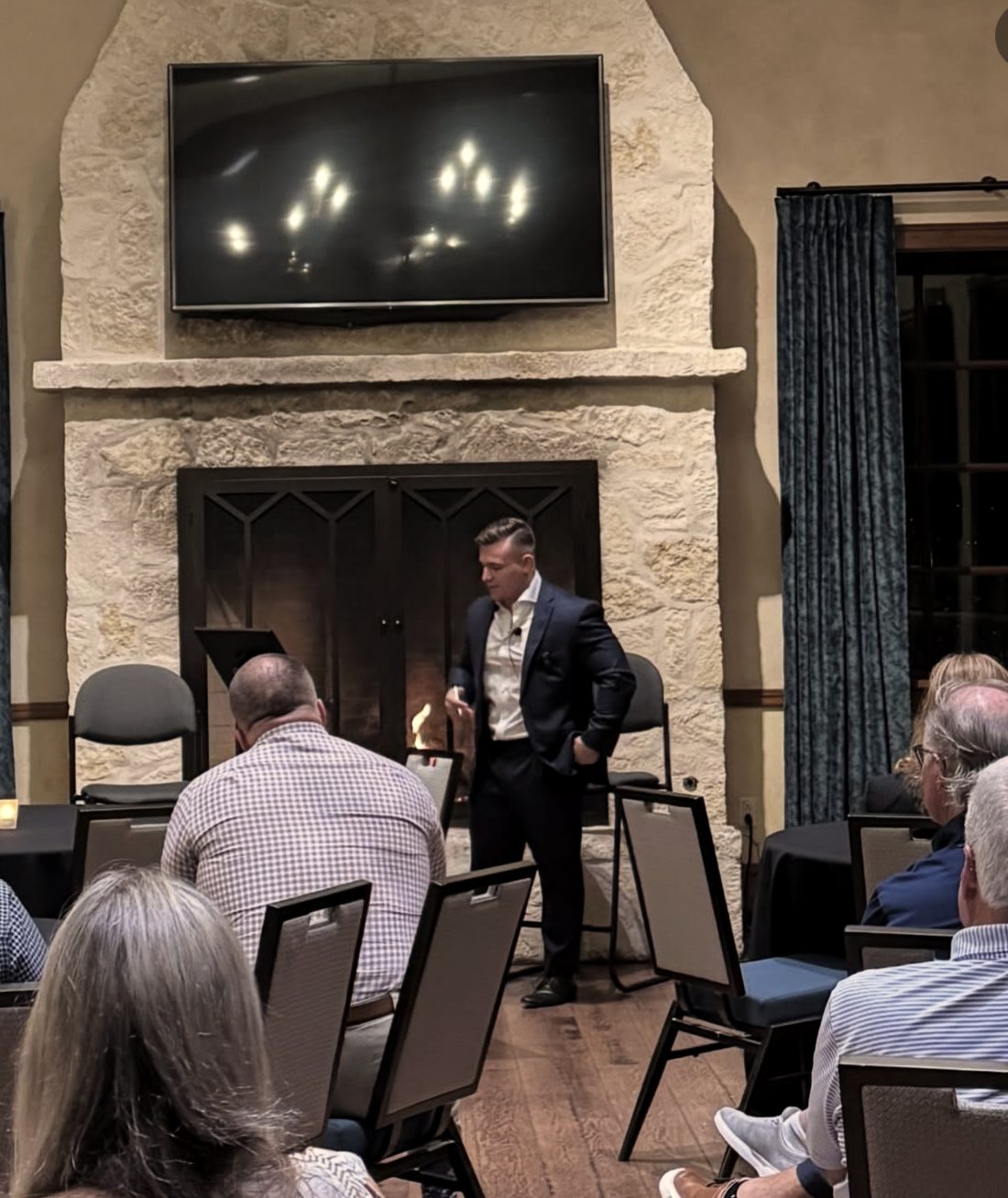 Gavin Adin giving a keynote on greatness in Texas
